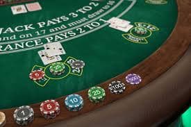 Live roulette wheel and betting layout